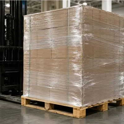 Reliable Pallet Stretch Film Wrap Manufacturer & Factory in China
Are you looking for a reliable pallet stretch film wrap manufacturer in China that can provide stable product quality, customized specifications and dependable export support?
Foshan JYE Packaging Materials Co., Ltd. manufactures LLDPE pallet stretch film for importers, packaging distributors, warehouses, logistics companies and industrial users. Our stretch films are designed to secure cartons, bags, boxes and irregular products on pallets during warehouse handling, container loading and long-distance transportation.
We supply hand stretch film, machine stretch film, pre-stretched film, colored pallet wrap and customized industrial stretch film. Thickness, width, roll length, color, core size, roll weight, labels and export cartons can be adjusted according to your packaging operation.
Request a pallet stretch film quotation by sending us your pallet dimensions, cargo weight, wrapping method and required order quantity.
Pallet Stretch Film Factory at a Glance
JYE is located in Foshan, Guangdong, one of China’s established manufacturing regions.
Our published factory information includes:
Factory information JYE data
Manufacturing experience Approximately 10 years
Factory area Approximately 10,000 m²
Employees More than 50
Cast stretch film lines 2 production lines
Production operation 24-hour continuous operation
Monthly production capacity Up to 500 tons
Export markets More than 50 countries
Long-term customers More than 200
Factory location Foshan, Guangdong, China
These figures are taken from JYE’s current official company profile.
Learn more about our workshop, production equipment and company background on the JYE stretch film factory profile.
What Is Pallet Stretch Film Wrap?
Pallet stretch film wrap is a flexible LLDPE packaging film that is stretched around palletized products. The film creates holding force around cartons or packaged goods and clings to itself without requiring heat or additional adhesive tape.
A correctly selected pallet wrapping film can help:
Hold cartons together as one palletized unit
Reduce movement during forklift handling
Improve load stability in trucks and containers
Protect products from warehouse dust and light moisture
Reduce scratches during routine handling
Conceal products when black or opaque film is used
Improve manual or automated packing efficiency
Stretch film is different from shrink film. Stretch film secures the load through stretching, tension and self-cling, while shrink film normally requires heat to contract around a product.
Pallet Stretch Film Wrap Specifications
Item Available option
Product name Pallet Stretch Film Wrap
Material LLDPE
Production technology Cast stretch film
Film types Hand, machine and pre-stretched film
Published thickness range 10–40 μm, depending on film type
Width 100–1,500 mm
Core diameter 1.5-inch, 2-inch or 3-inch
Color Clear, black, blue or customized
Stretch ratio Up to 300%, depending on product grade
Surface Customized cling performance
Roll length Standard or customized
Roll weight Customized for hand or machine use
Printing Private label and custom packaging available
Packing Export cartons or pallet packing
Applications Pallet wrapping, warehouse storage and export packaging
The main manufacturer page currently publishes a 10–40 μm range, widths from 100 to 1,500 mm, several core sizes and stretch performance of up to 300%, depending on film type.
Because different product pages on the current website show slightly different thickness ranges, confirm the final production specification before publishing the table or issuing a quotation.
Pallet Stretch Film Types We Manufacture
Hand Pallet Stretch Film
Hand stretch film is designed for manual pallet wrapping. It is suitable for warehouses, packing stations, retail distribution centers and operations that wrap a relatively small number of pallets each day.
Hand rolls can be customized by:
Film width
Film thickness
Roll length
Net film weight
Core diameter
Film color
Carton quantity
Private-label packaging
Browse our hand stretch film products.
Machine Pallet Stretch Film
Machine stretch film is manufactured for semi-automatic and automatic pallet wrapping machines. It provides more controlled film tension and is suitable for factories and warehouses with higher packaging volumes.
When requesting machine film, provide:
Wrapping-machine model
Pre-stretch setting
Film carriage type
Current film width and thickness
Roll weight
Core diameter
Pallets wrapped per day
Current film-break or load-stability problem
Explore our machine stretch film range.
Pre-Stretched Pallet Film
Pre-stretched film has already been mechanically stretched during production. It requires less operator force during application and can help improve wrapping consistency for certain manual operations.
The suitability of pre-stretched film depends on pallet weight, load shape and required containment force.
Clear Pallet Stretch Film
Clear stretch film keeps carton labels, barcodes and product markings visible. It is commonly used for warehouse storage, factory shipments and logistics operations where goods must remain identifiable.
Black and Colored Stretch Film
Black pallet stretch film helps conceal pallet contents. Blue, green and other customized colors can support:
Warehouse zoning
Product classification
Shipment identification
Customer branding
Inventory management
Privacy protection
Jumbo Roll Stretch Film
Jumbo rolls are intended for converting and rewinding operations. They are suitable for packaging distributors or converters that produce smaller hand or machine rolls locally.
View our jumbo roll stretch film options.
How to Select the Right Pallet Stretch Film Wrap
Choosing film only by price per roll can result in unstable pallets, excess film consumption or repeated film breaks. A suitable specification should be based on the complete packaging application.
1. Check the Cargo Weight
Light cartons generally require less containment force than heavy industrial products. However, the total pallet weight should not be the only selection factor.
A heavy but uniform load can sometimes be easier to secure than a lighter load with irregular shapes or sharp corners.
2. Evaluate the Load Shape
Tell the manufacturer whether the pallet contains:
Uniform cartons
Mixed-size boxes
Bagged materials
Bottles or cans
Furniture
Machinery components
Building materials
Sharp metal parts
Products extending beyond the pallet edge
Sharp corners and pallet overhang increase puncture and tearing risks. Edge protectors may be required in addition to a stronger stretch film.
3. Select the Wrapping Method
Choose hand stretch film for manual wrapping and lower daily pallet volumes.
Choose machine stretch film when using automatic or semi-automatic equipment and when consistent wrapping tension, speed and repeatability are important.
4. Select a Starting Thickness
JYE’s current FAQ provides the following starting recommendations:
Load condition Starting recommendation
Light cartons 17–20 μm
General pallet shipping 20–25 μm
Heavy or sharp products Heavy-duty grade selected after testing
Film thickness is only one factor. Resin formulation, puncture resistance, stretch performance, cling, load retention and wrapping tension can be equally important. JYE’s FAQ recommends 17–20 μm for light cargo and 20–25 μm for general pallet shipments.
Read our guide to selecting the correct stretch film micron.
5. Test the Film on an Actual Pallet
Before confirming a large order, test the proposed film under your normal operating conditions.
A practical test should evaluate:
Film break frequency
Corner puncture resistance
Cling after wrapping
Load movement
Film consumption per pallet
Operator handling
Machine compatibility
Pallet condition after transportation
The lowest-priced roll is not necessarily the lowest-cost packaging solution. Compare the total film consumption and load stability per pallet.
Why Choose JYE as Your Pallet Stretch Film Manufacturer?
Direct Factory Supply
Working with a direct pallet stretch film factory gives buyers clearer control over product specifications, packaging requirements, production communication and repeat-order consistency.
JYE manufactures stretch film in Foshan and supplies products directly to international B2B buyers.
Stable Production Capacity
The JYE factory operates two cast stretch film production lines continuously and publishes monthly output of up to 500 tons. This capacity supports regular wholesale orders and customized packaging requirements.
Custom Specifications
We can discuss customization of:
Film thickness
Film width
Roll length
Net roll weight
Core diameter
Clear or colored film
Hand or machine film
Cling performance
Printed labels
Logo packaging
Outer cartons
Pallet packing
Shipping marks
Final availability depends on order quantity and production confirmation.
OEM and Private-Label Packaging
JYE supports OEM and customized packaging for importers, distributors and packaging brands.
Send your logo, label dimensions, carton artwork, barcode requirements and target market. Packaging details can be confirmed before mass production.
Quality-Control Process
Quality checks may include:
Raw-material inspection
Film-thickness measurement
Width and roll-weight checking
Stretch-performance testing
Tensile-strength checking
Puncture-resistance evaluation
Cling-performance inspection
Winding and roll-appearance inspection
Carton and pallet inspection before shipment
For regulated applications, request the current test report or certificate that corresponds to the exact film formulation and specification being purchased.
Export Experience
JYE’s official company profile states that products have been supplied to more than 50 countries and that the company has established long-term cooperation with more than 200 customers.
Export support can include:
Commercial packing
Export cartons
Palletized loading
Shipping marks
Private labels
Product documents
Container-loading coordination
How Do You Verify a Reliable Stretch Film Factory in China?
Before selecting a pallet stretch film supplier, ask for evidence instead of relying only on a low quotation.
A reliable supplier should be able to provide:
1.Company registration information
2.Factory address
3.Current workshop photos or video
4.Production-line information
5.Available product specifications
6.Quality-control procedures
7.Relevant test reports
8.Product samples
9.Export packaging details
10.Clear quotation terms
You should also compare samples from different production batches. Consistency between repeat orders is often more important than the performance of one specially prepared sample.
Read our guide to evaluating a packaging stretch film supplier.
Information Needed for a Pallet Stretch Film Quote
To receive a useful quotation, provide more than a product name.
Please send:
Hand or machine application
Pallet length, width and height
Approximate cargo weight per pallet
Cargo type
Regular or irregular load shape
Presence of sharp edges
Current film thickness
Required film width
Required roll length or net weight
Core diameter
Clear or colored film
Number of pallets wrapped per day
Order quantity
Destination country
Destination port
OEM packaging requirements
Current packaging problem
When these details are available, the manufacturer can recommend a specification based on the actual application instead of quoting a generic pallet wrap roll.
Free Sample Support
Samples can be arranged for product evaluation before a bulk order. JYE’s current FAQ states that free samples are available and that the customer is responsible for courier costs such as DHL, FedEx or UPS. Production lead time depends on order quantity.
During sample testing, record:
Pallets wrapped per roll
Film breaks per pallet
Wrapping time
Number of layers
Load movement
Damage after transport
This data makes it easier to compare total packaging cost rather than only roll price.
Frequently Asked Questions
Are you a pallet stretch film manufacturer or a trading company?
JYE is a stretch film manufacturer located in Foshan, Guangdong, China. We manufacture pallet stretch film for manual, machine and customized packaging applications.
What material is pallet stretch film made from?
Our standard stretch film is manufactured from LLDPE. The selected formulation depends on the required stretch, cling, puncture resistance and wrapping method.
What pallet stretch film products do you manufacture?
We supply hand stretch film, machine stretch film, pre-stretched film, clear stretch film, colored stretch film and jumbo rolls.
Can you customize pallet stretch film wrap?
Yes. Thickness, width, roll length, weight, core, color, labels and outer packaging can be discussed according to your order requirements.
What is the best film thickness for pallet wrapping?
There is no single thickness suitable for every pallet. Light and uniform cartons may require less film strength, while heavy, irregular or sharp products require stronger puncture resistance and containment force.
Is hand stretch film different from machine stretch film?
Yes. Hand film is designed for manual application. Machine stretch film is manufactured for automatic or semi-automatic wrapping equipment and should match the machine’s film carriage and pre-stretch settings.
Can I order black pallet stretch film?
Yes. Black and customized colored films can be discussed for product concealment, warehouse identification or branding.
Can you provide private-label cartons?
Yes. OEM labels, logos, carton artwork and other private-label requirements can be confirmed before production.
Can I test a sample before placing a bulk order?
Yes. Samples can be arranged for testing. The customer normally pays the international courier cost.
What information should I send for a quotation?
Provide the film type, thickness, width, roll length or weight, core diameter, color, wrapping method, order quantity and destination port. Pallet dimensions and load information will help the factory recommend a more suitable film.
Request a Quote from a Pallet Stretch Film Factory in China
JYE supplies customized pallet stretch film wrap for warehousing, industrial packaging, logistics and export shipments.
Contact us with your required specifications and packaging application:
Telephone / WhatsApp / WeChat: +86 13632970701
Email: info@jyestretchwrap.com
Factory address: No. 1 Workshop, Building B, Industrial Zone, Luodong Village, Shishan Town, Nanhai District, Foshan, Guangdong, China
Request a pallet stretch film quote
Browse pallet stretch film products
Download the JYE stretch film catalog
The contact details and stated response time of within 24 hours are published on JYE’s official contact page.